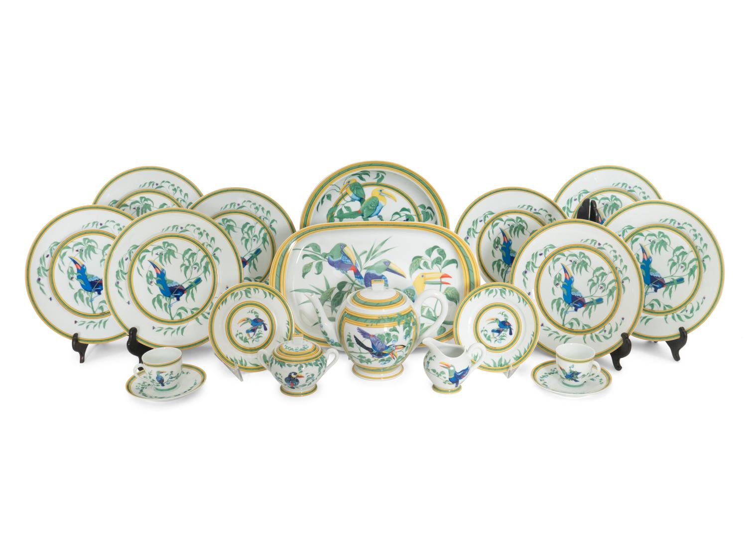 An Hermès Toucans Porcelain Dinner Service