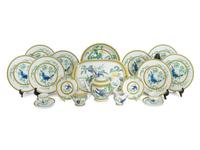 An Hermès Toucans Porcelain Dinner Service