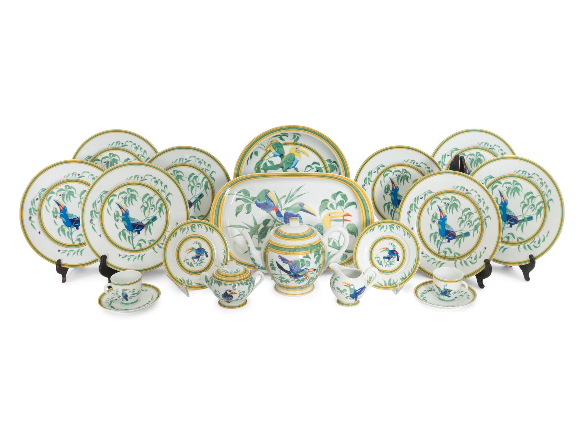 An Hermès Toucans Porcelain Dinner Service