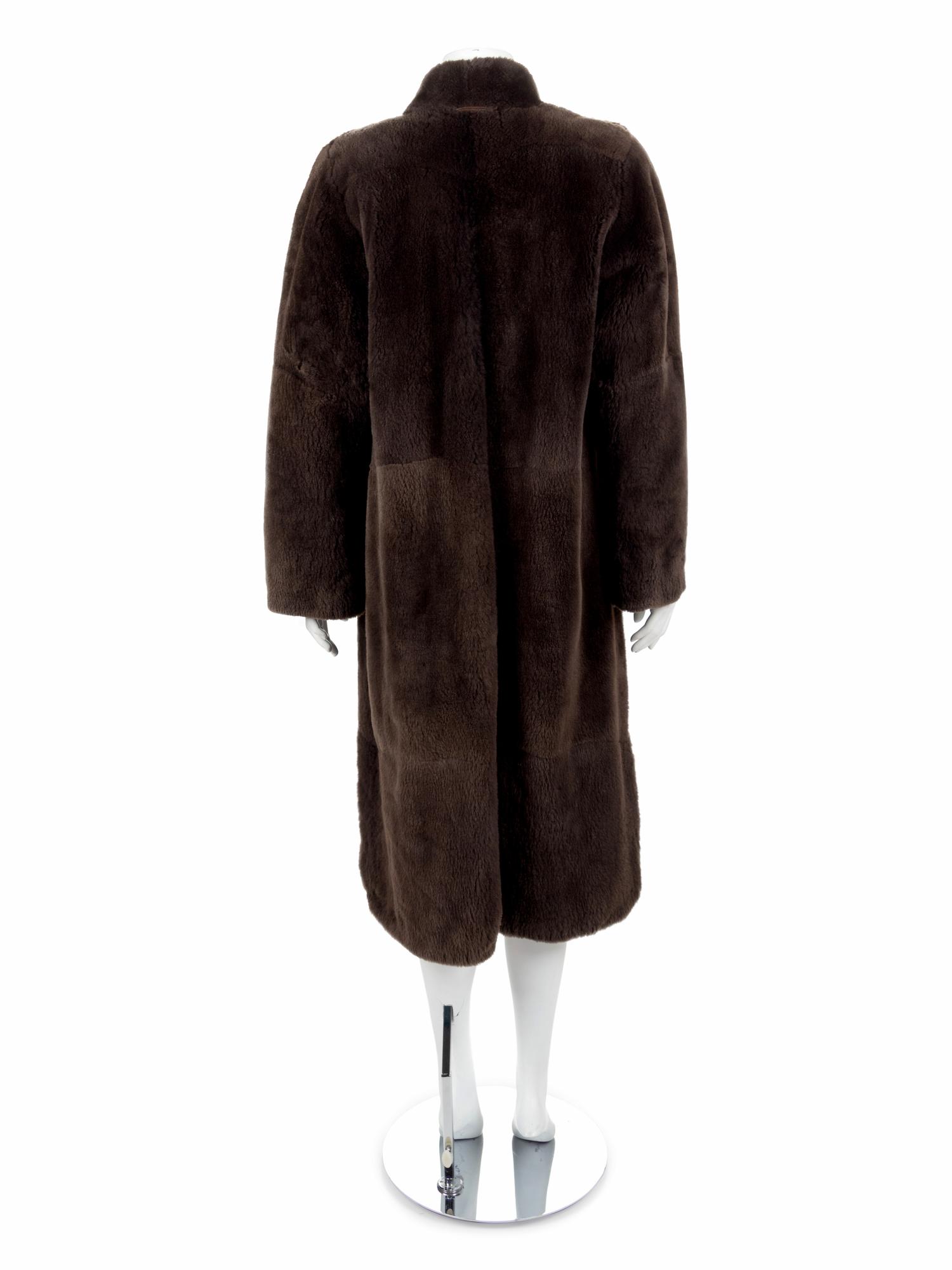 A Long Brown Fur Coat with button and loop closure, 1970's-1980's