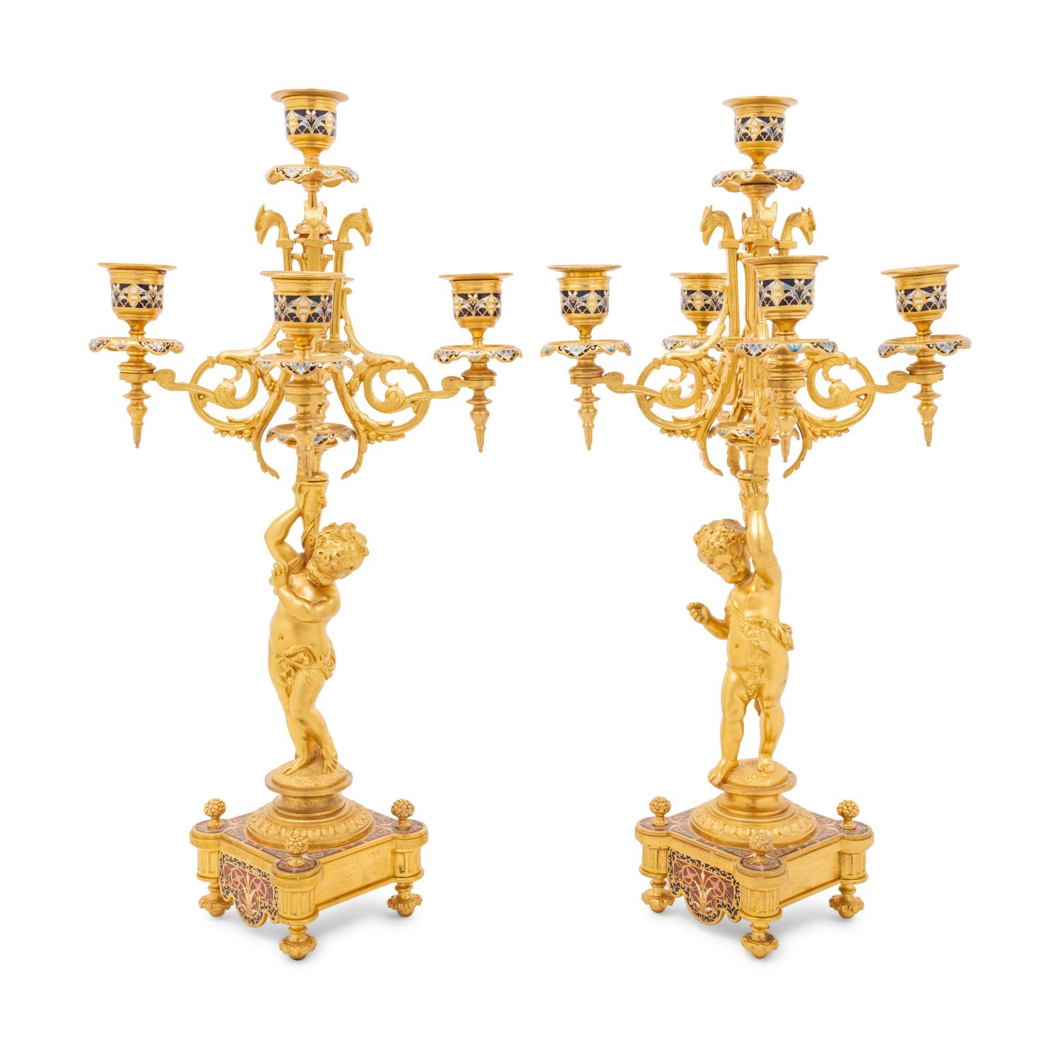 A Pair of French Gilt Bronze and Champlevé Five-Light Candelabra
