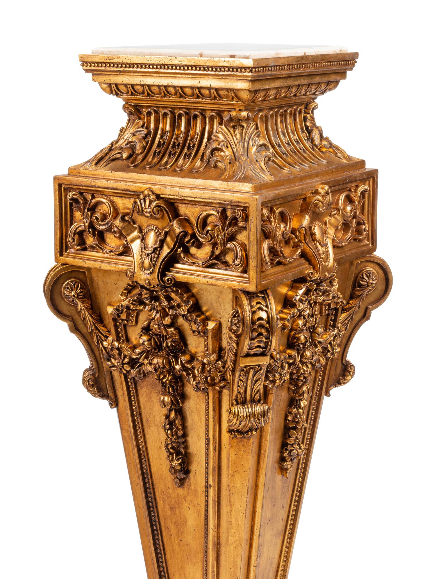 A Pair of Régence Style Giltwood Marble-Top Pedestals