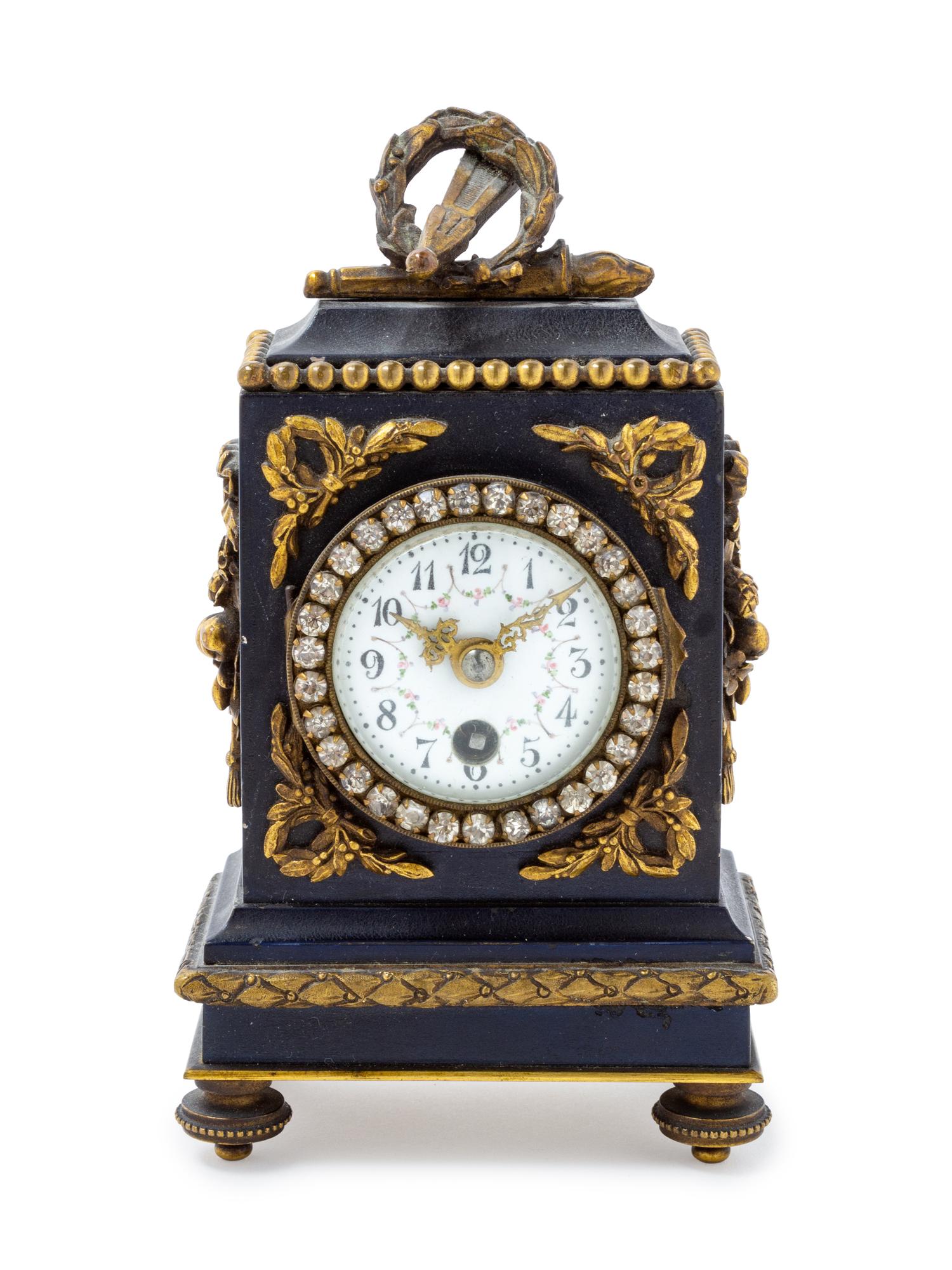 A French Gilt Bronze Mounted Carriage Clock