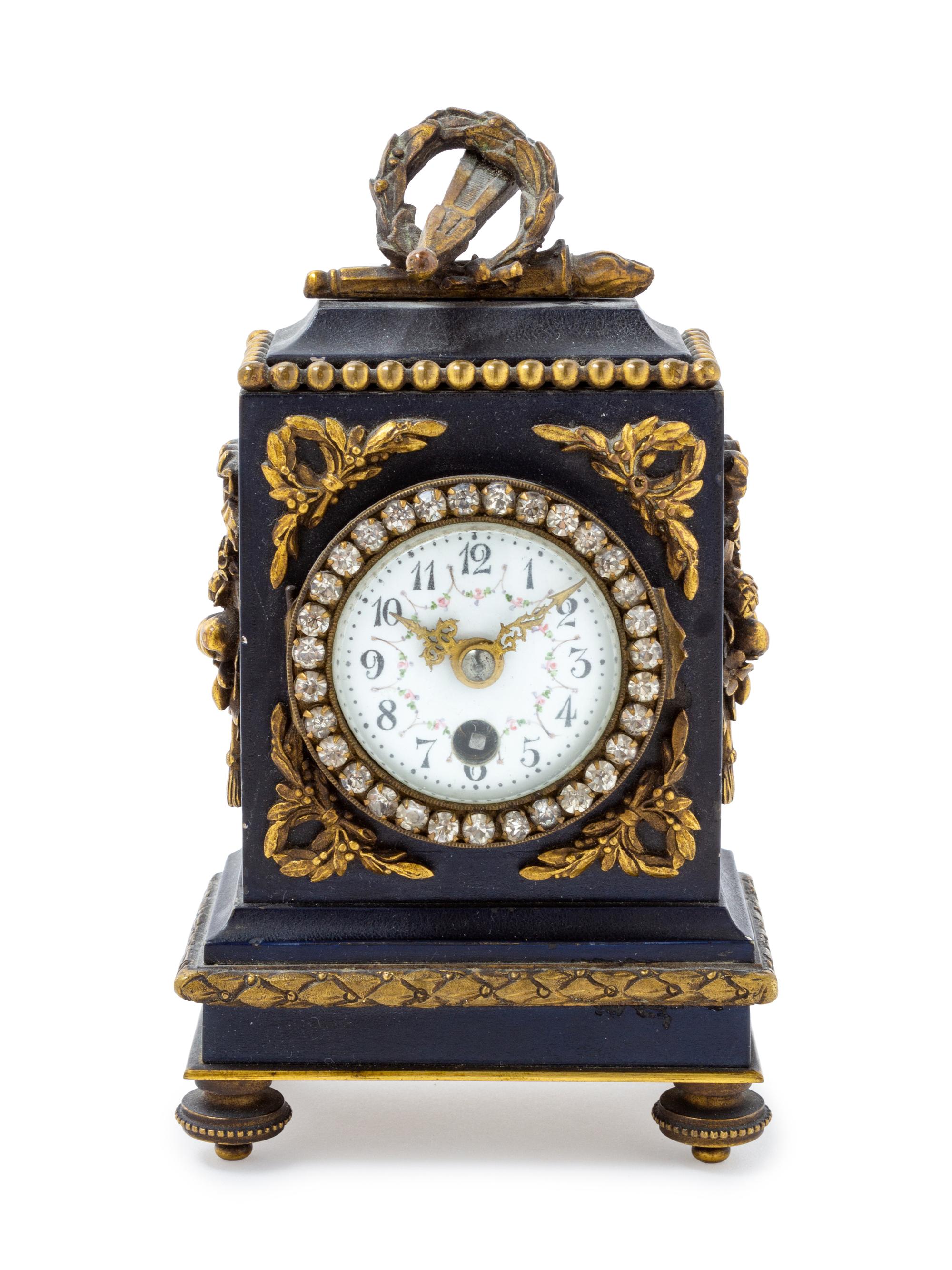 A French Gilt Bronze Mounted Carriage Clock