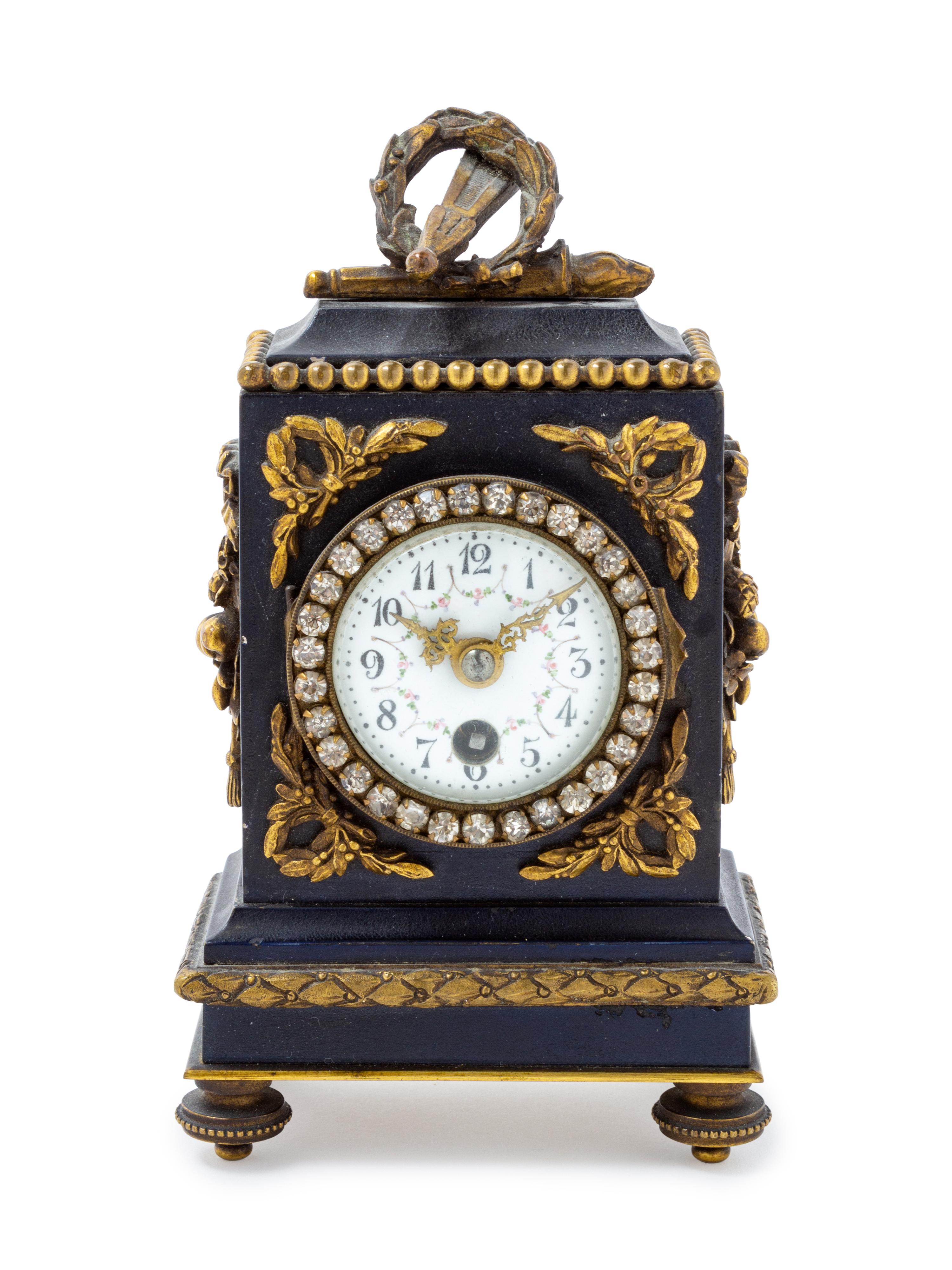 A French Gilt Bronze Mounted Carriage Clock