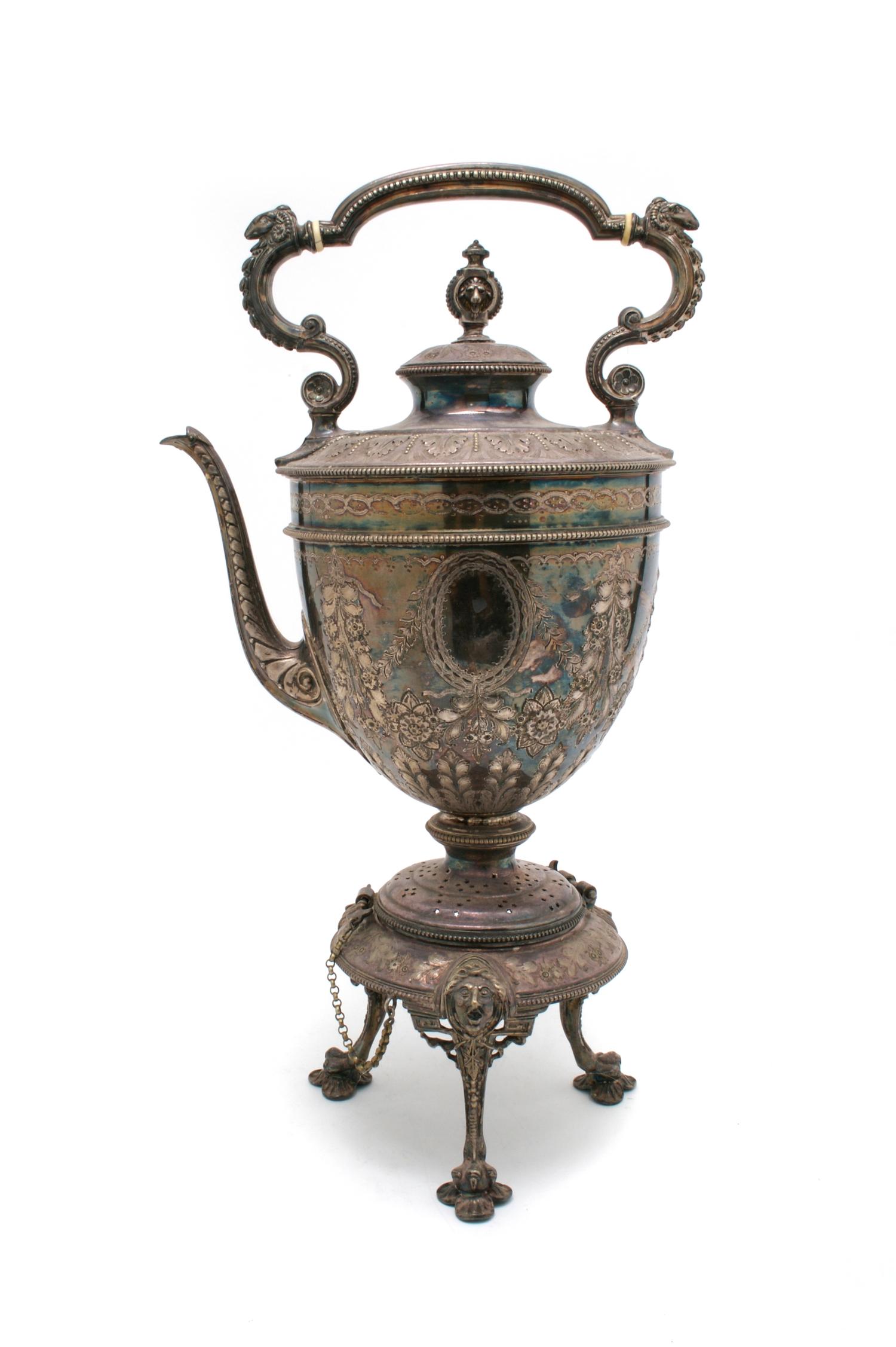 A Silverplate Hot Water Kettle on Stand, possibly English, Height overall 19 inches.
