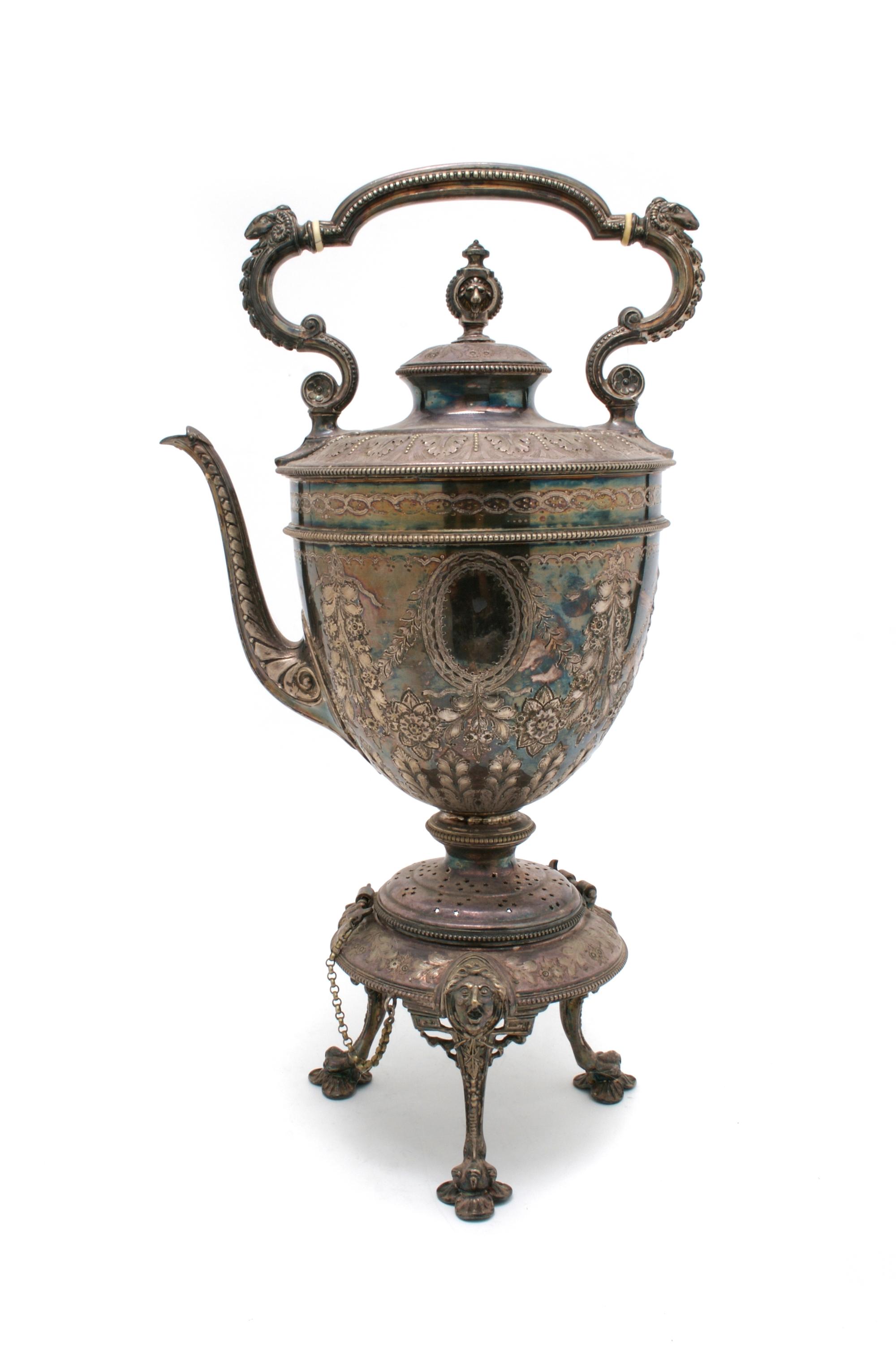 A Silverplate Hot Water Kettle on Stand, possibly English, Height overall 19 inches.