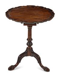 A George III Carved Mahogany Tilt-Top Tea Table
