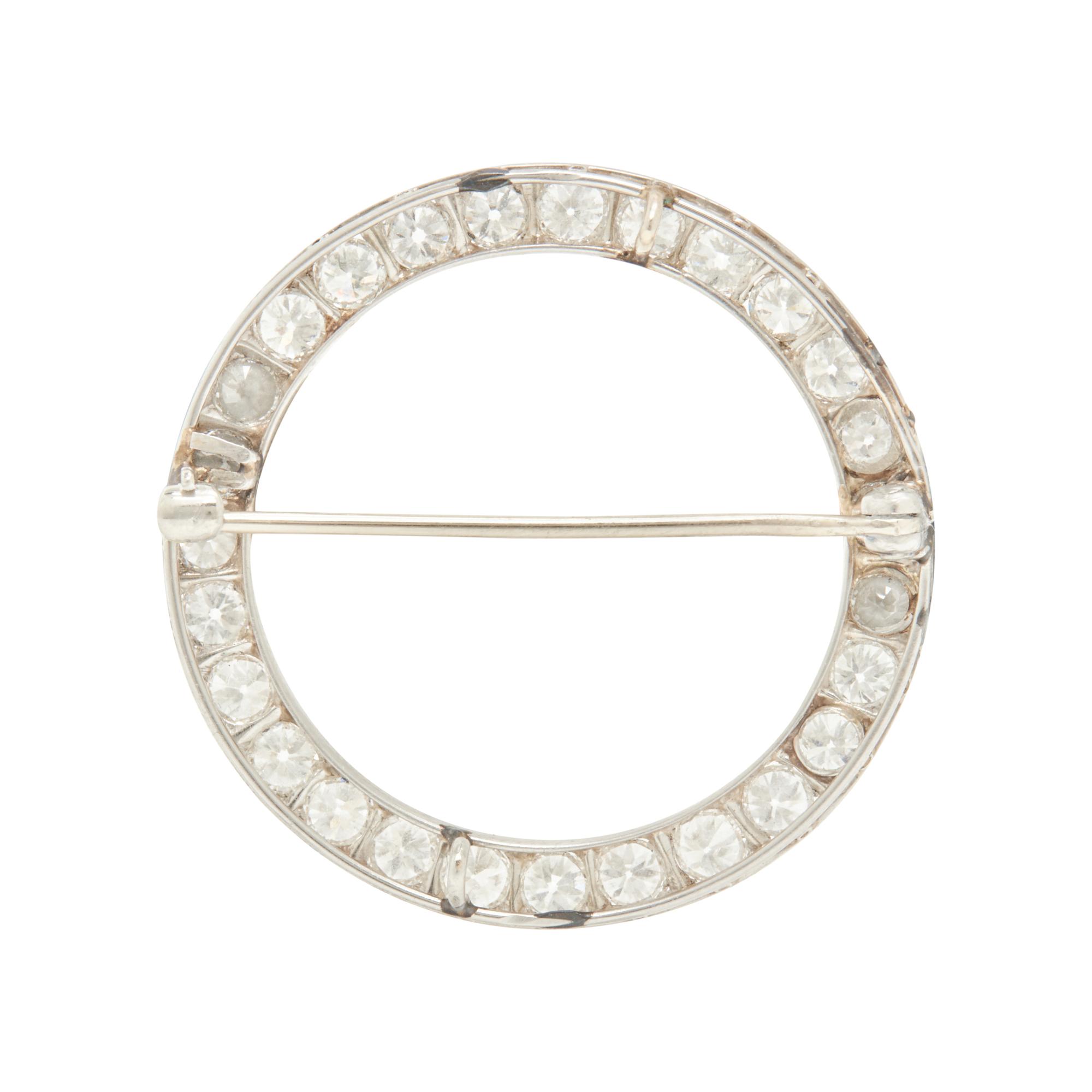 ART DECO, PLATINUM AND DIAMOND CIRCLE BROOCH