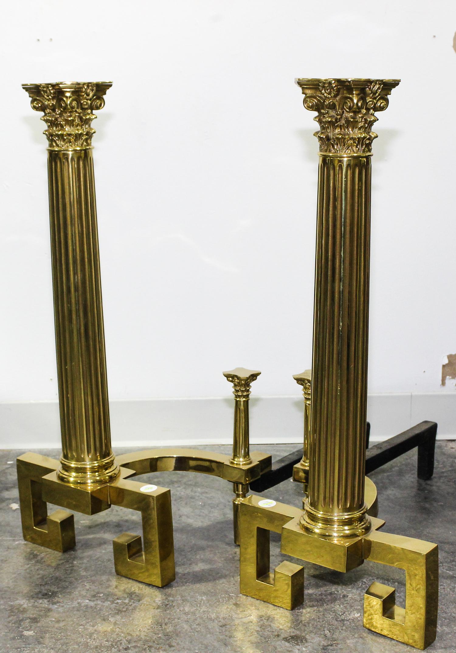 A Pair of Neoclassical Style Brass Andirons Height 27 inches. — 20TH CENTURY