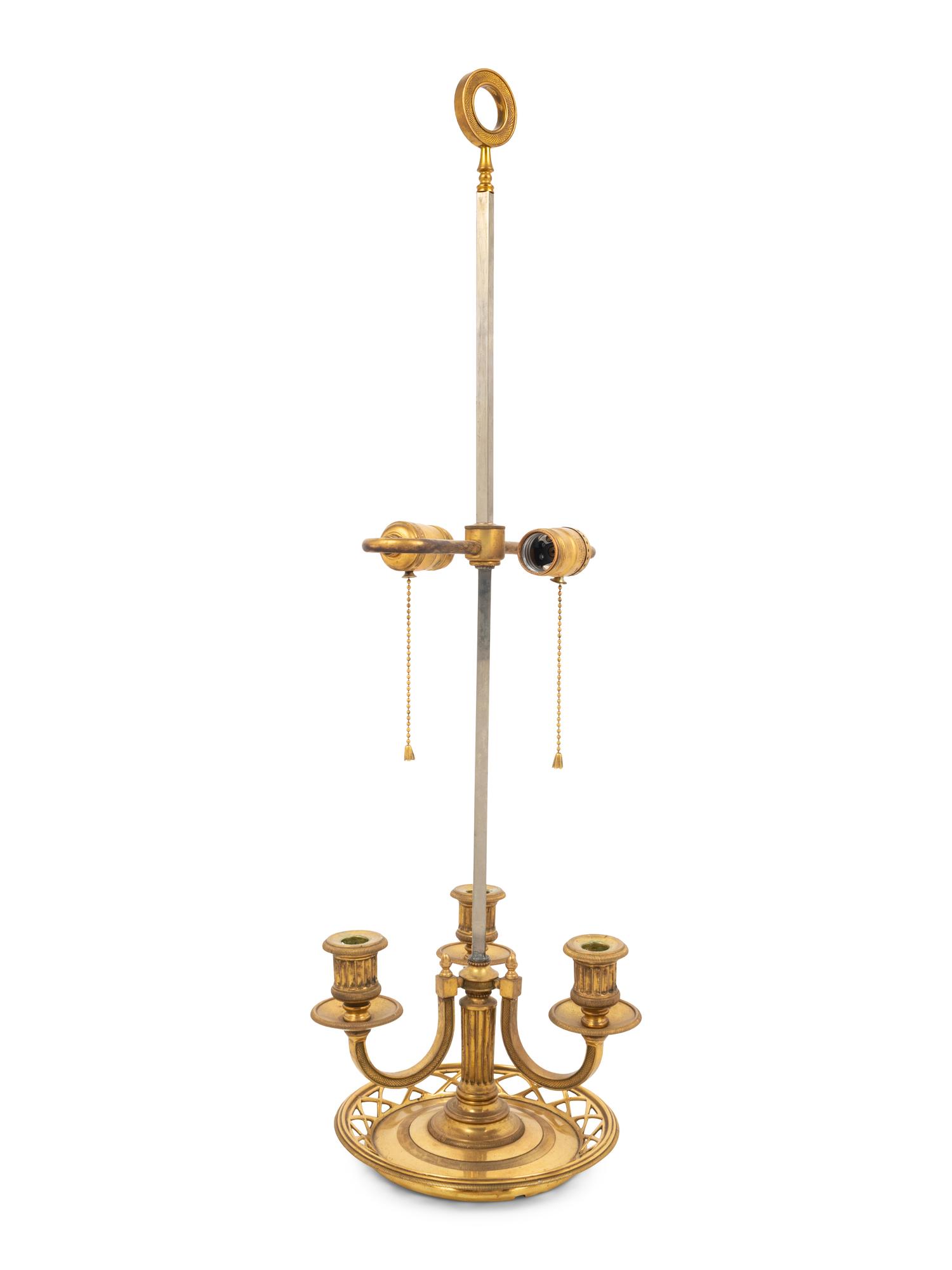 An Empire Style Brass Bouillotte Lamp with a Tôle Shade