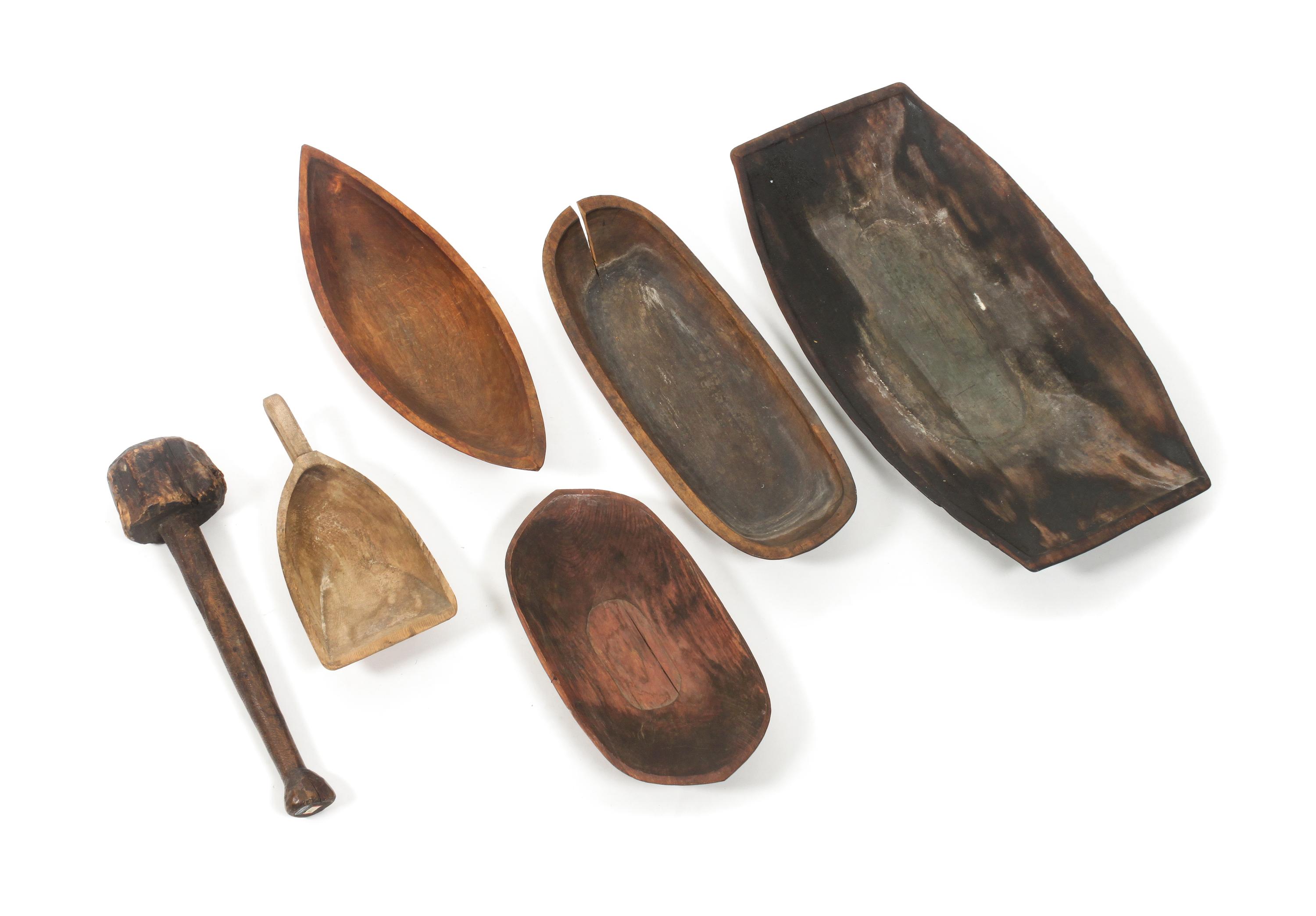 Four Northwest Coast/ Aleutian Chain Wood Bowls Length of largest bowl 24 1/2 x 13 3/4 inches.