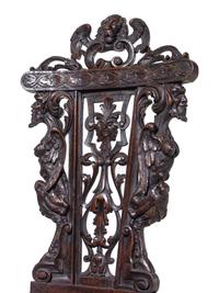 An English Renaissance Revival Carved Mahogany Hall Chair