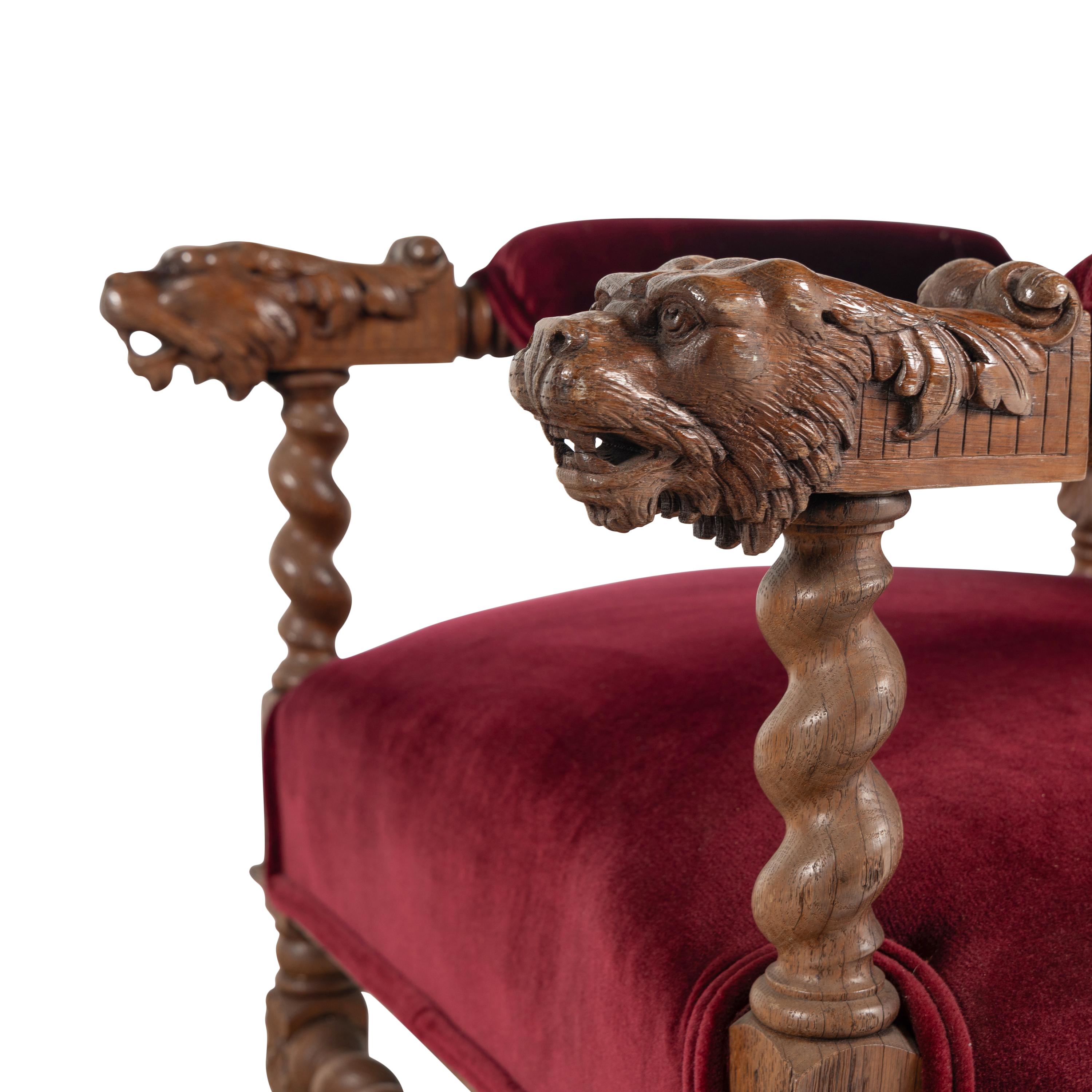 A Set of Twelve Charles II Style Carved Oak Dining Chairs