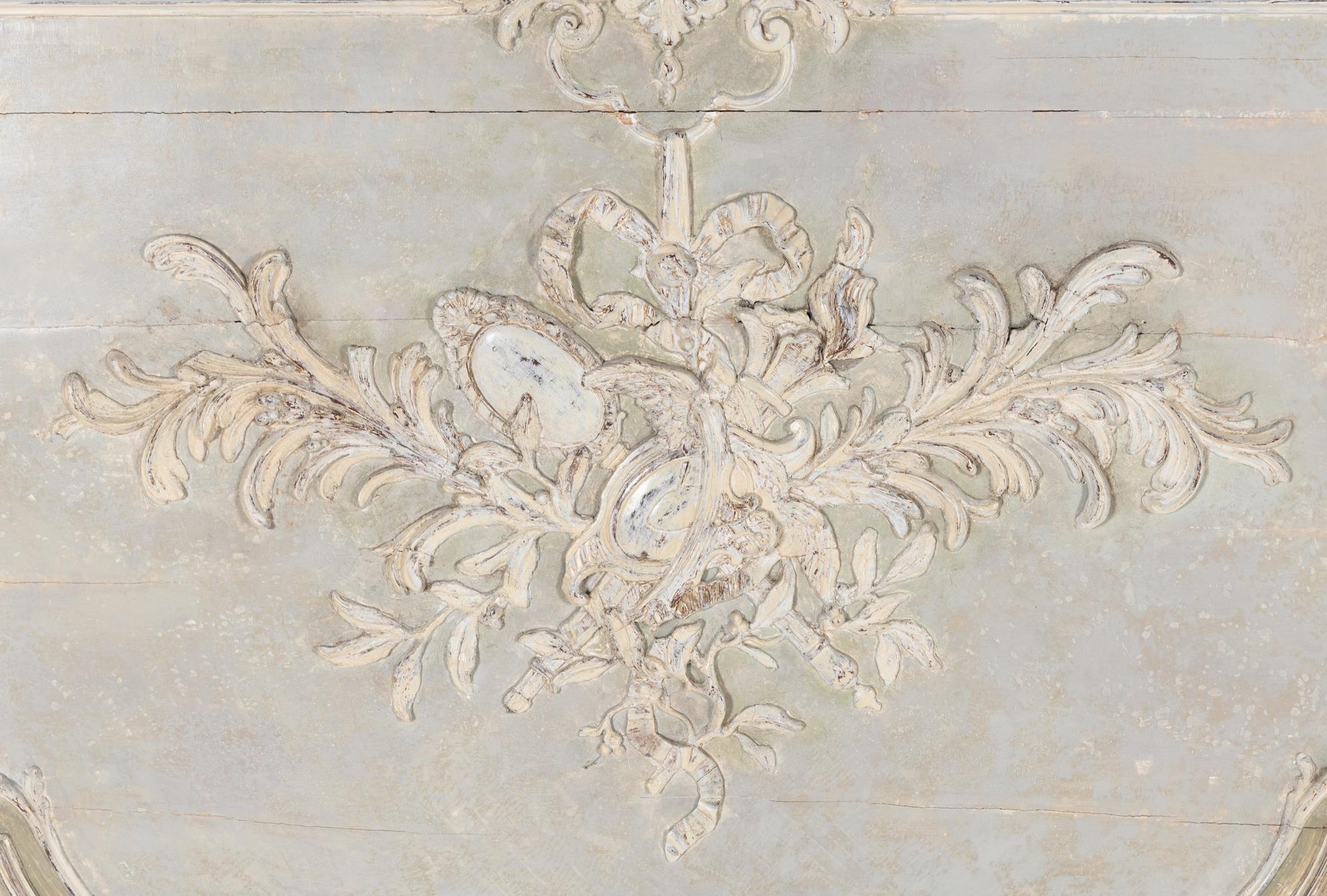Two French Carved and Painted Pine Overdoor Panels