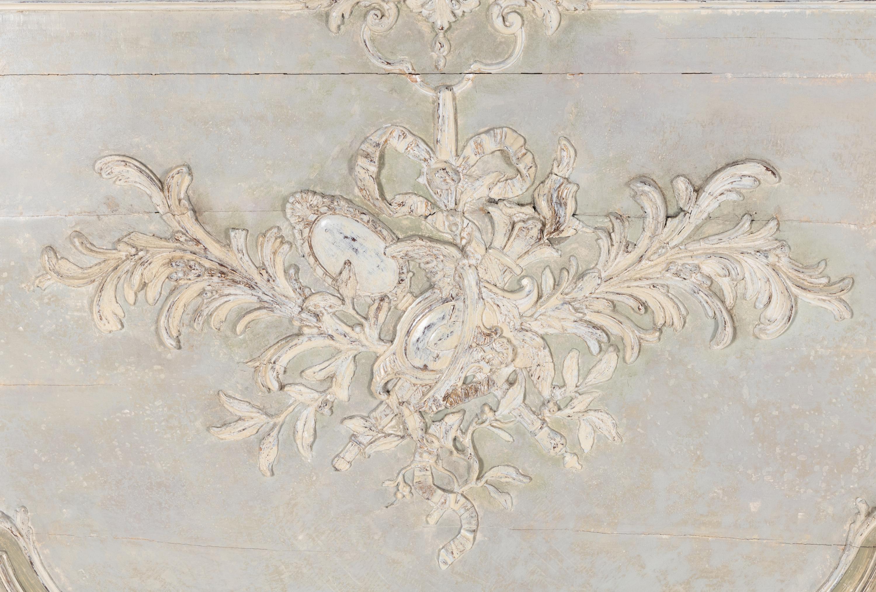 Two French Carved and Painted Pine Overdoor Panels