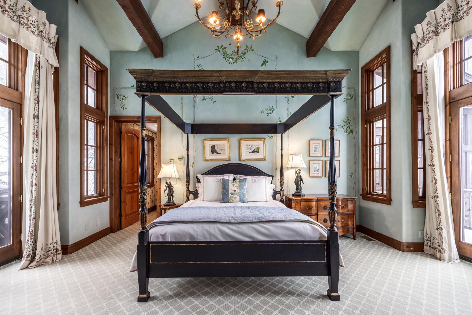 A Leather and Velvet Upholstered Armchair