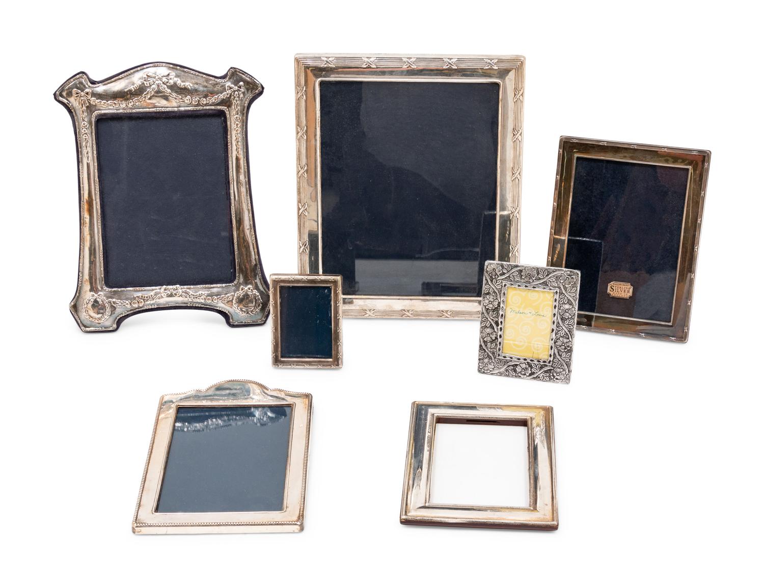 A Group of Seven English Silver Picture Frames