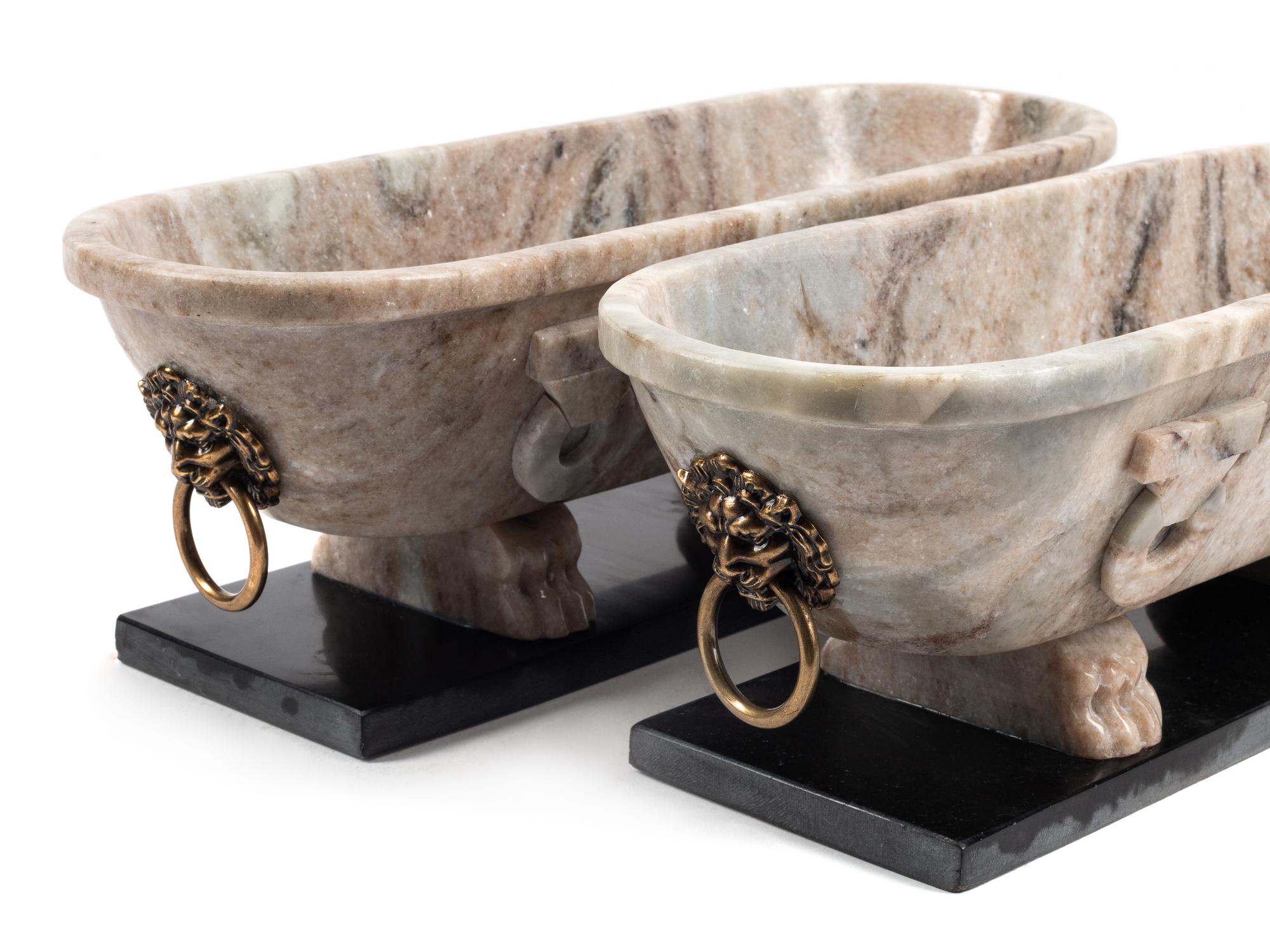 A Pair of Grand Tour Style Marble Sarcophogi