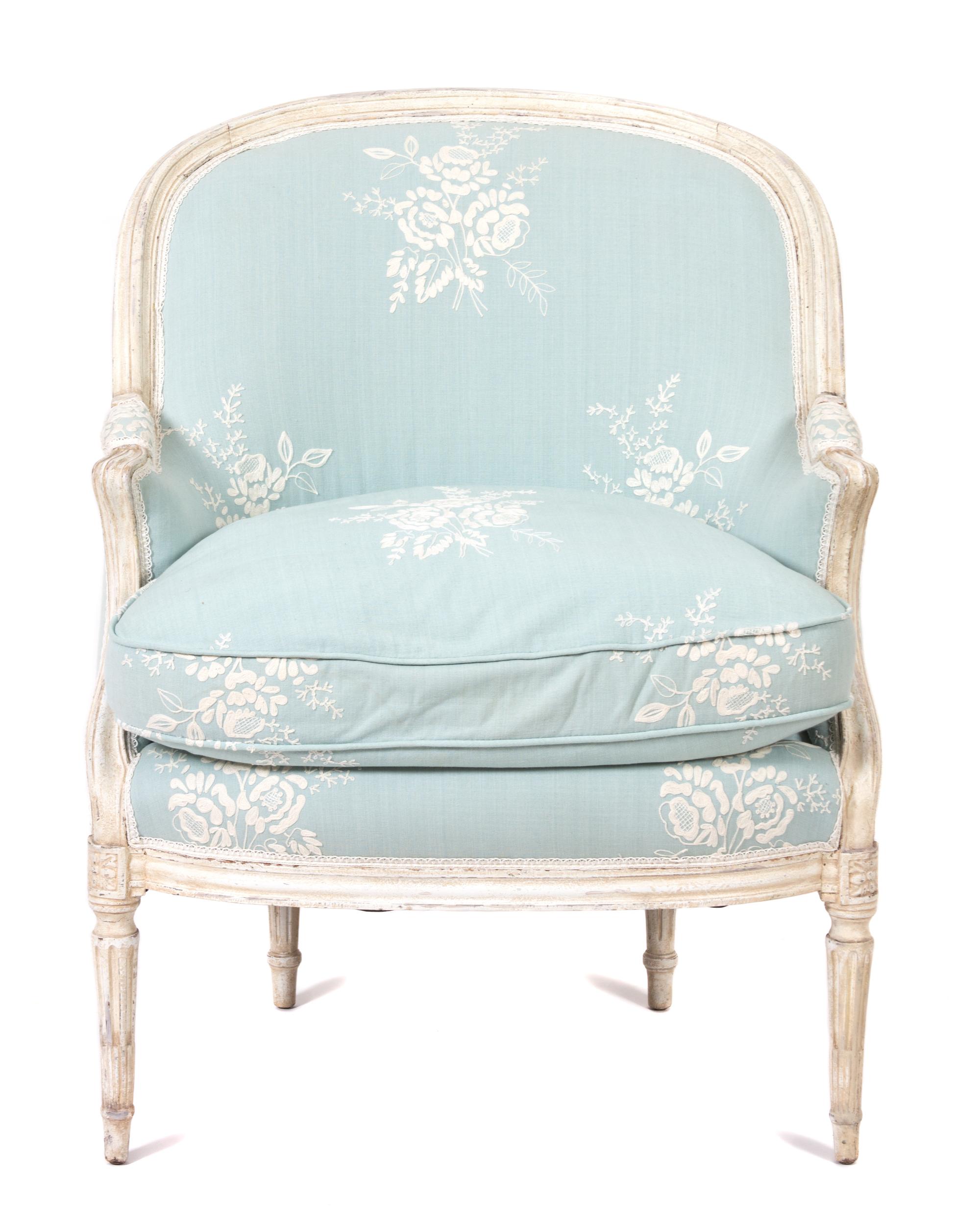 A Louis XVI Style Carved and Painted Bergere Height 37 inches. — 19TH CENTURY