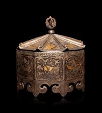 A Tibetan Gilt Decorated Metal Covered Box