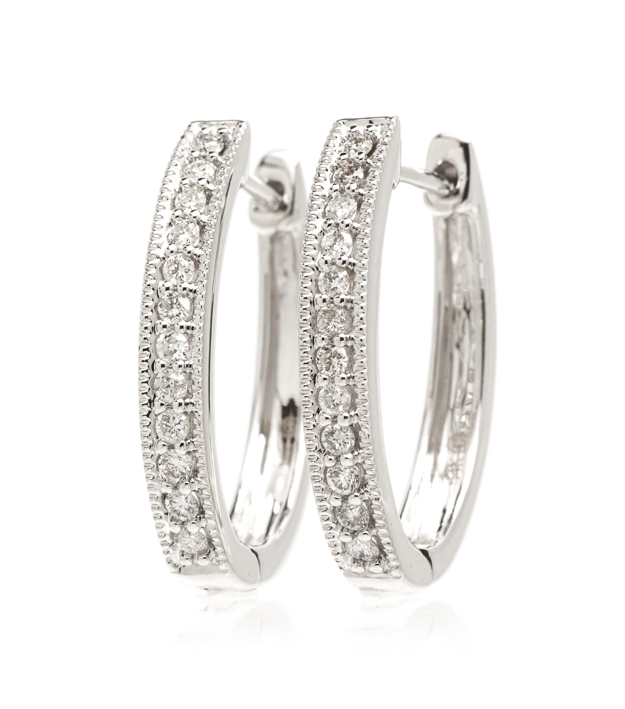 A Pair Of 14 Karat White Gold and Diamond Hoop Earrings, 2.50 dwts.