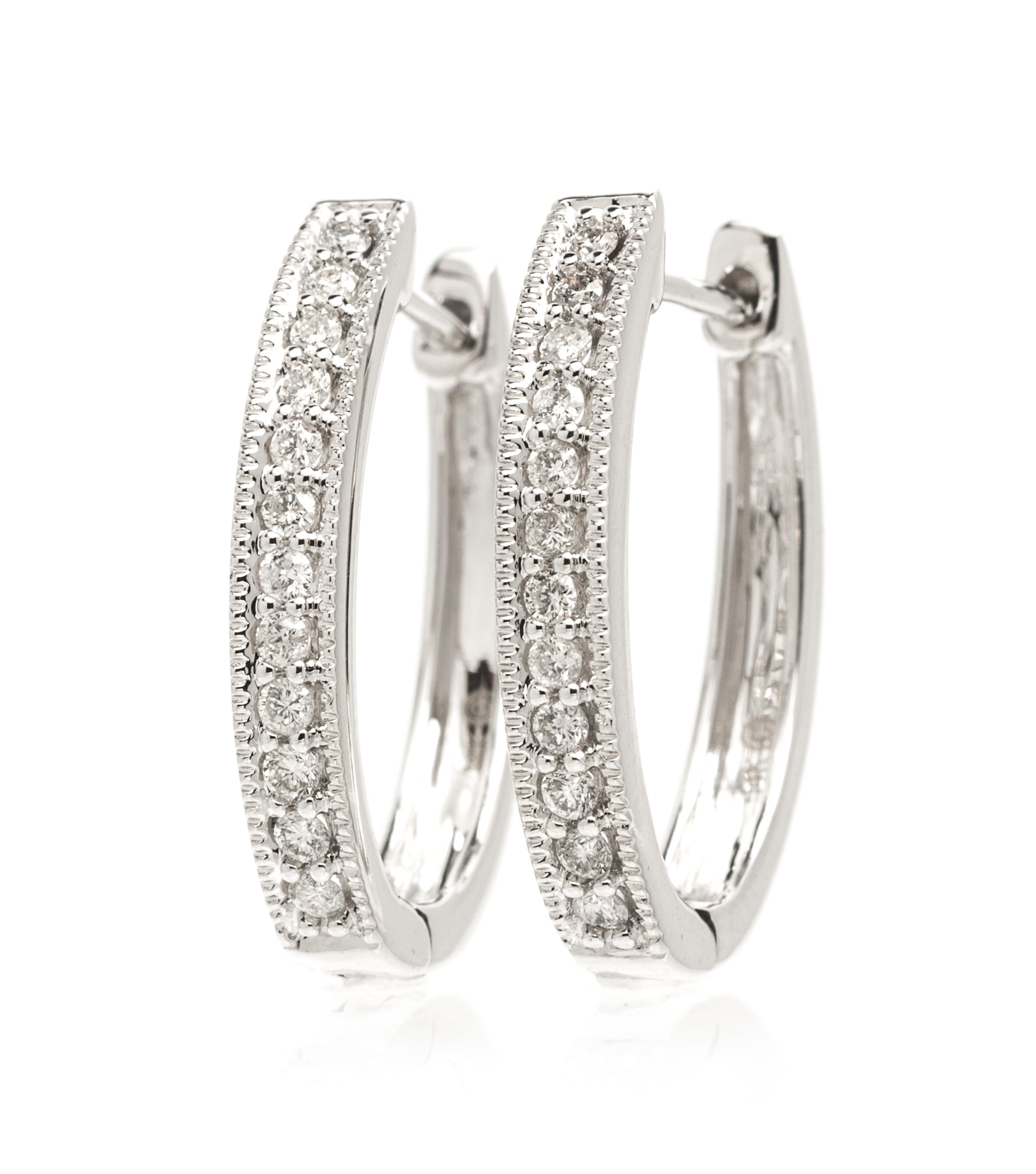 A Pair Of 14 Karat White Gold and Diamond Hoop Earrings, 2.50 dwts.