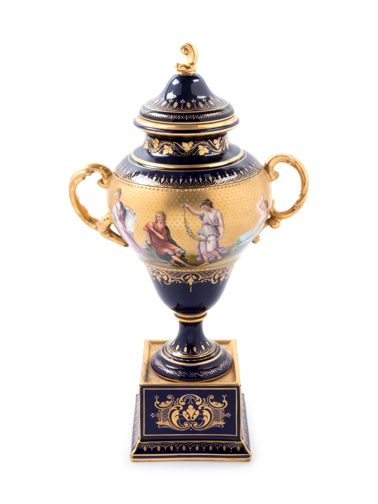 A Vienna Style Painted and Parcel Gilt Porcelain Covered Urn on Stand