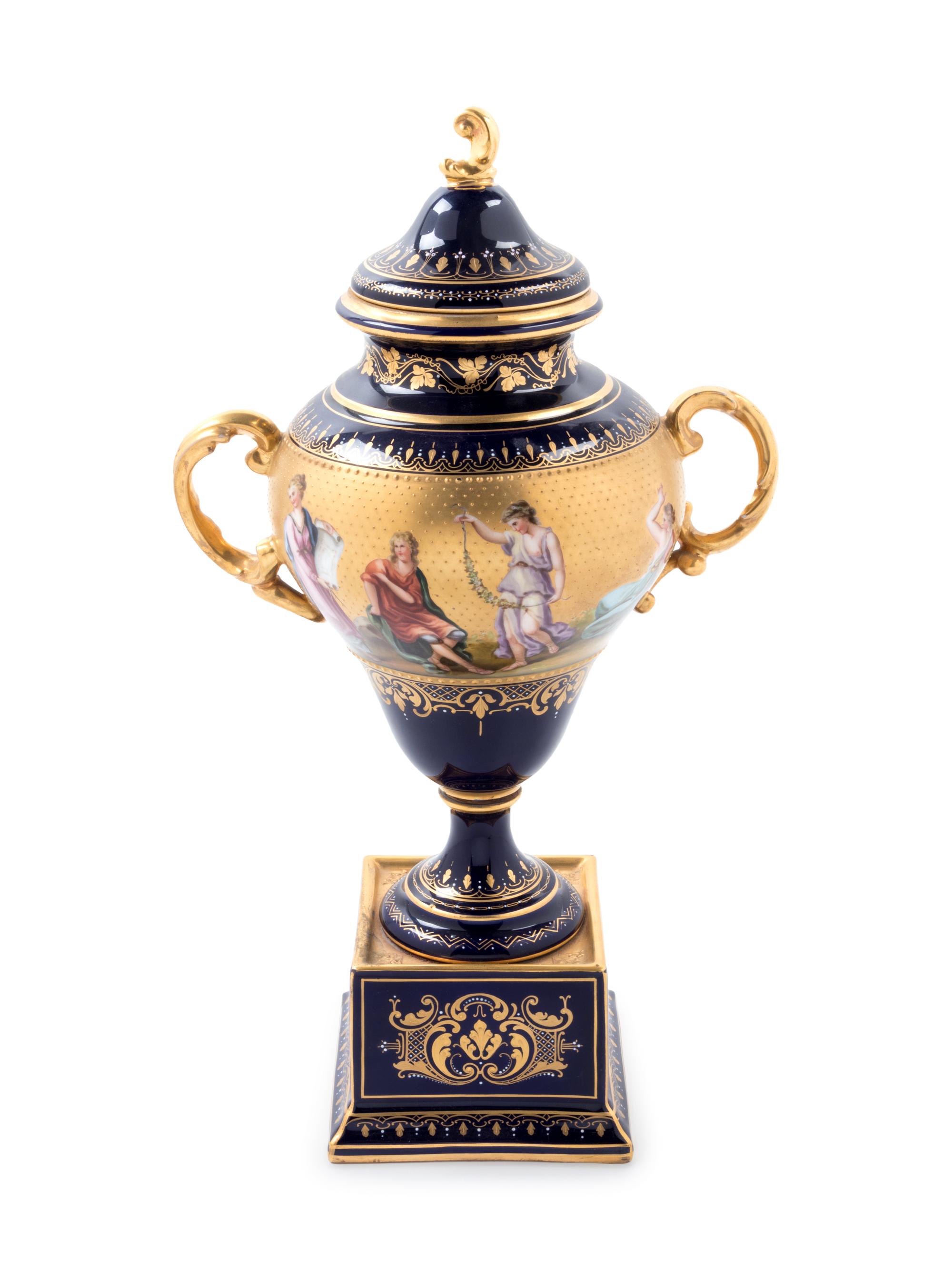 A Vienna Style Painted and Parcel Gilt Porcelain Covered Urn on Stand