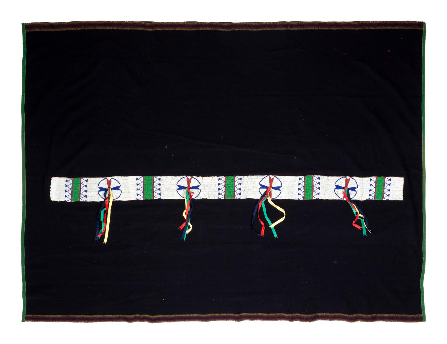 Sioux Beaded Hide Blanket Strip on Wool Blanket