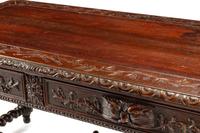 A French Renaissance Revival Carved Oak Library Table
