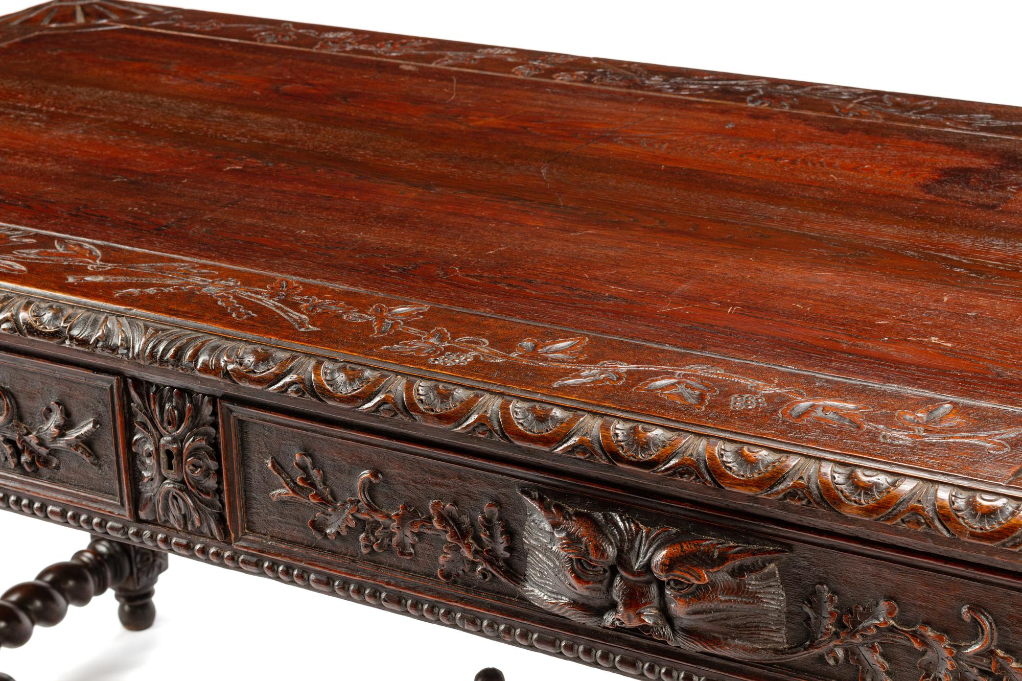 A French Renaissance Revival Carved Oak Library Table