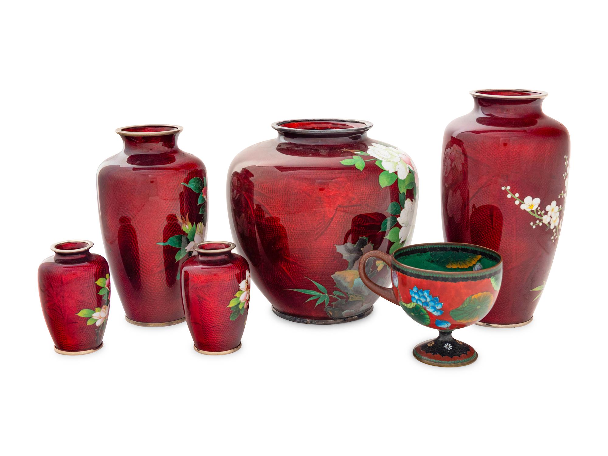 A Group of Six Japanese Red Ground Cloisonné Vessels