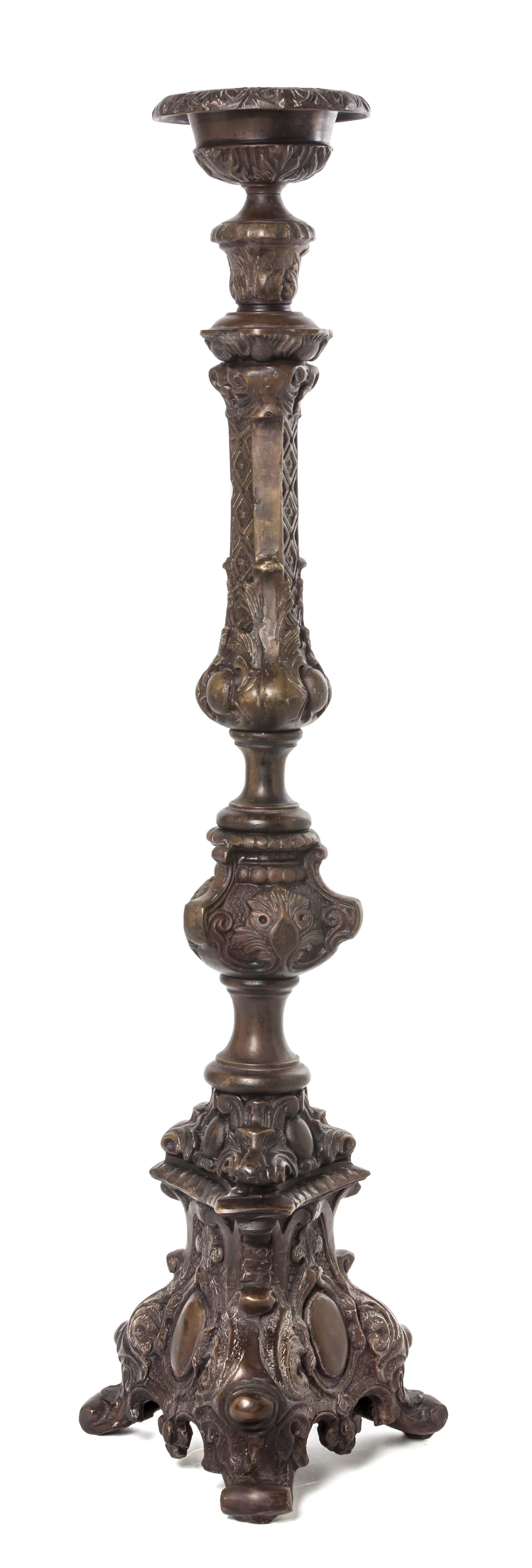 A Continental Bronzed Pricket Stick, Height 35 1/2 inches.