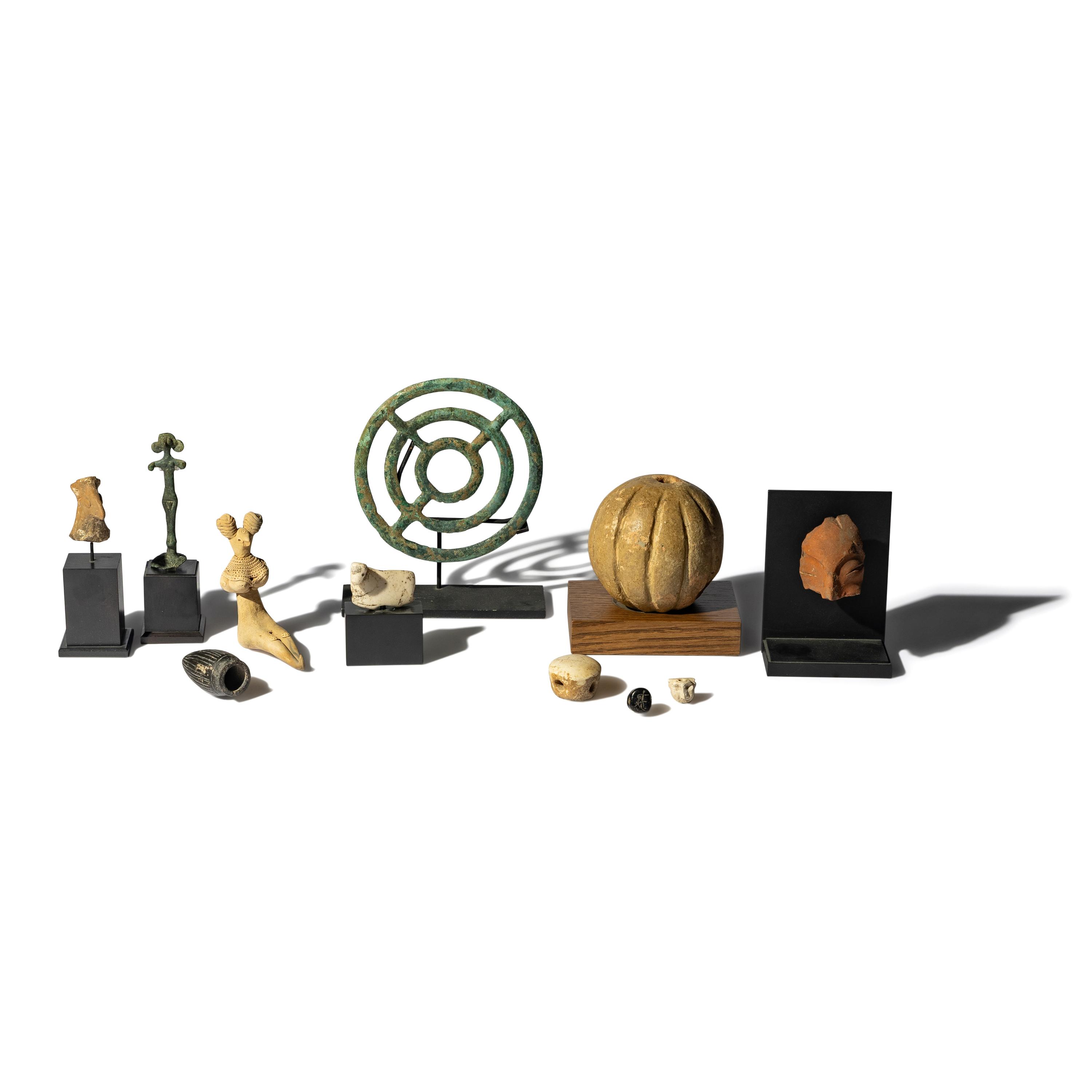 Eleven Near Eastern Stone, Bronze, and Terracotta Items