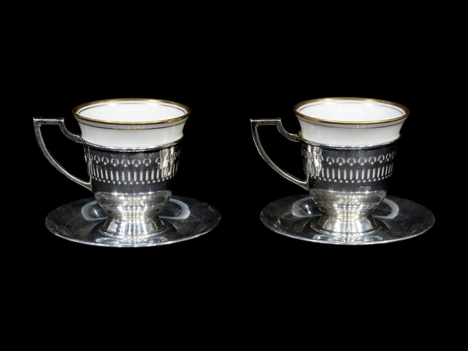A Set of Twelve American Silver Demitasse Cup Frames and Saucers