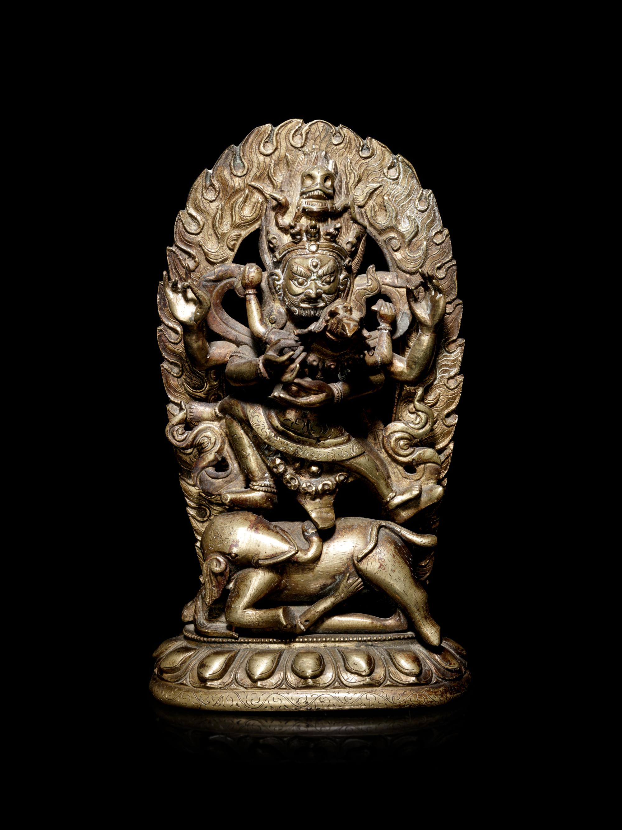 A Tibetan Gilt Bronze Figure of Mahakala and Consort