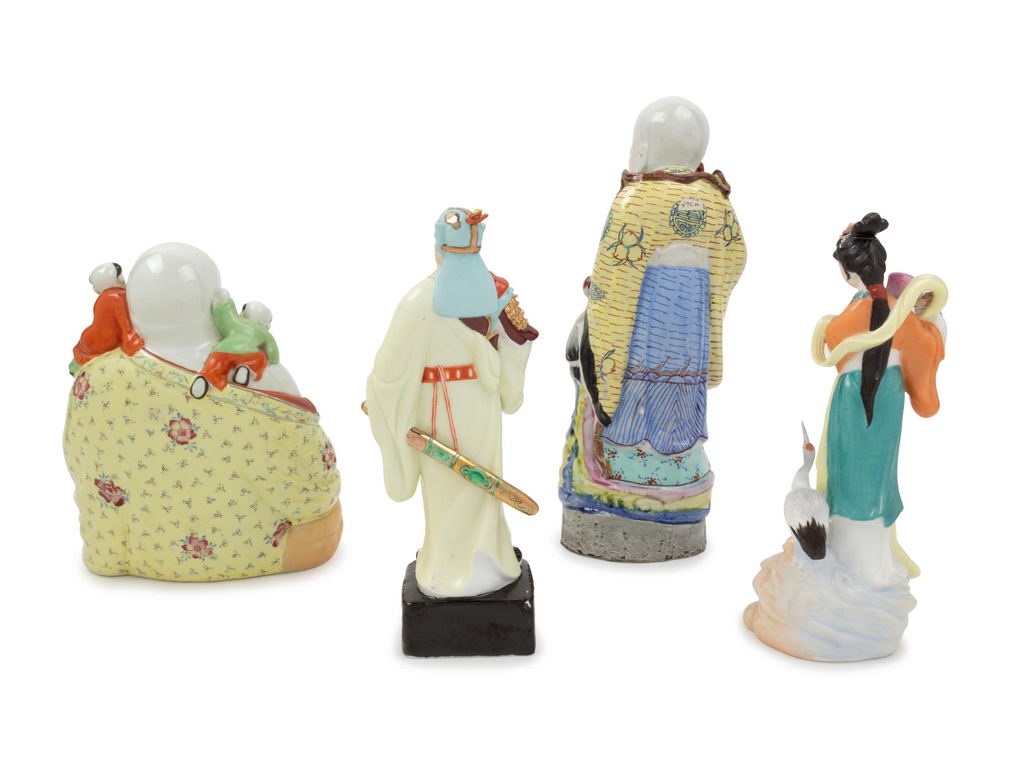 Four Chinese Famille Rose Porcelain Figures