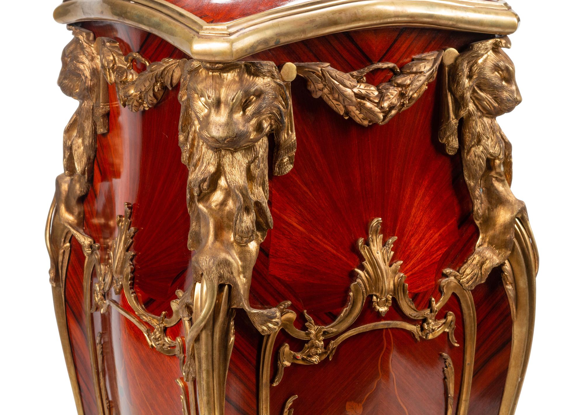 A Pair of Louis XV Style Gilt Bronze Mounted Marquetry Pedestals