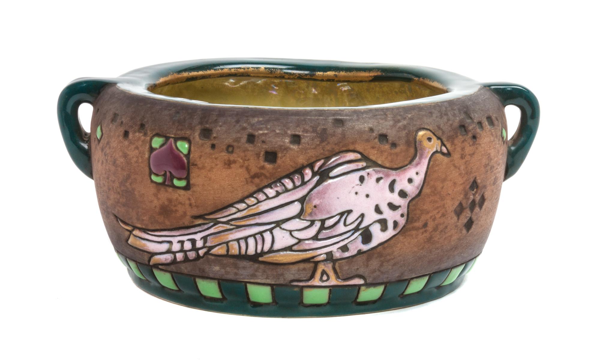 An Amphora Pottery Bowl Width over handles 8 1/2 inches.