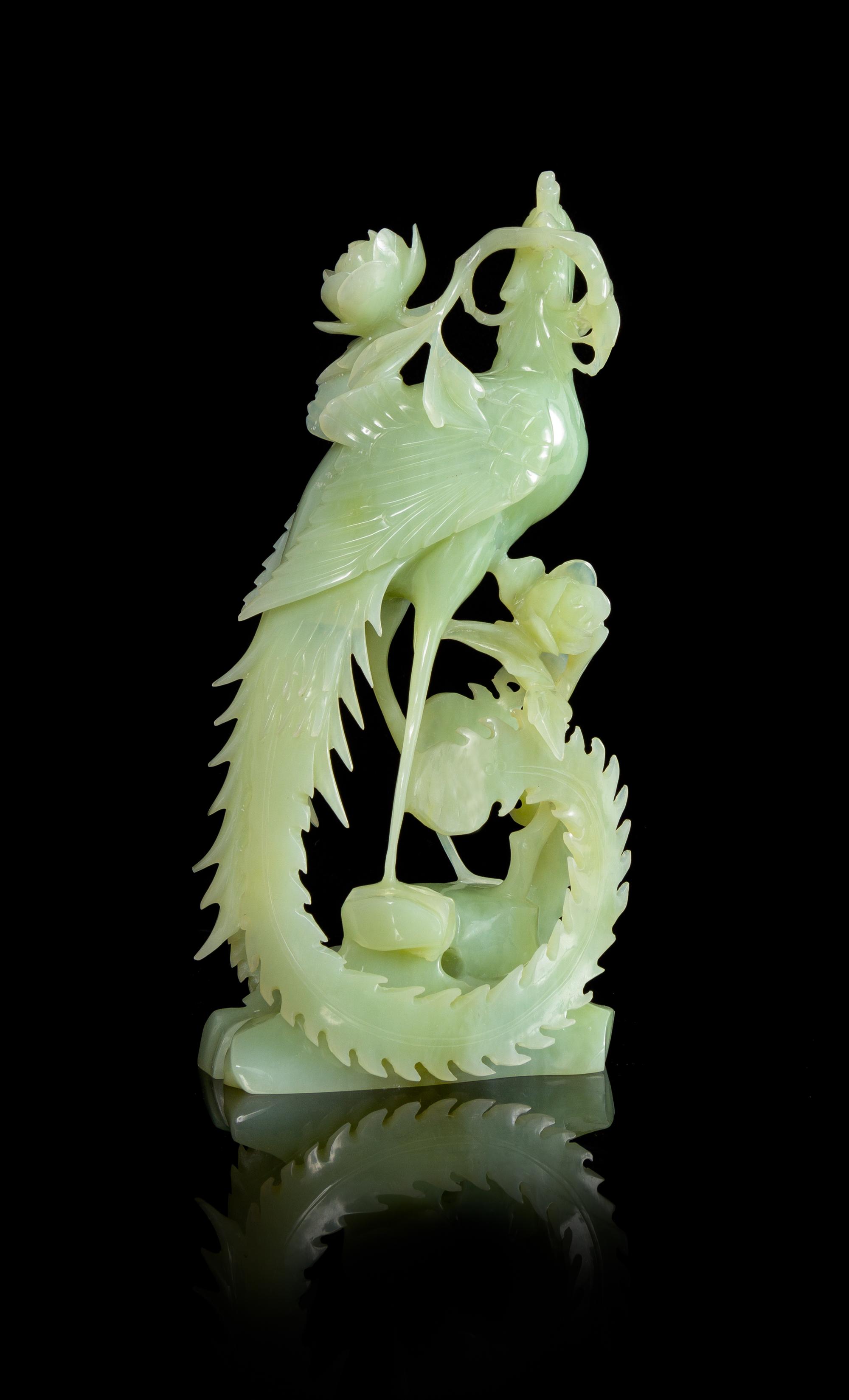 A Chinese Green Jade Figure of a Phoenix Height 8 inches. — 20TH CENTURY