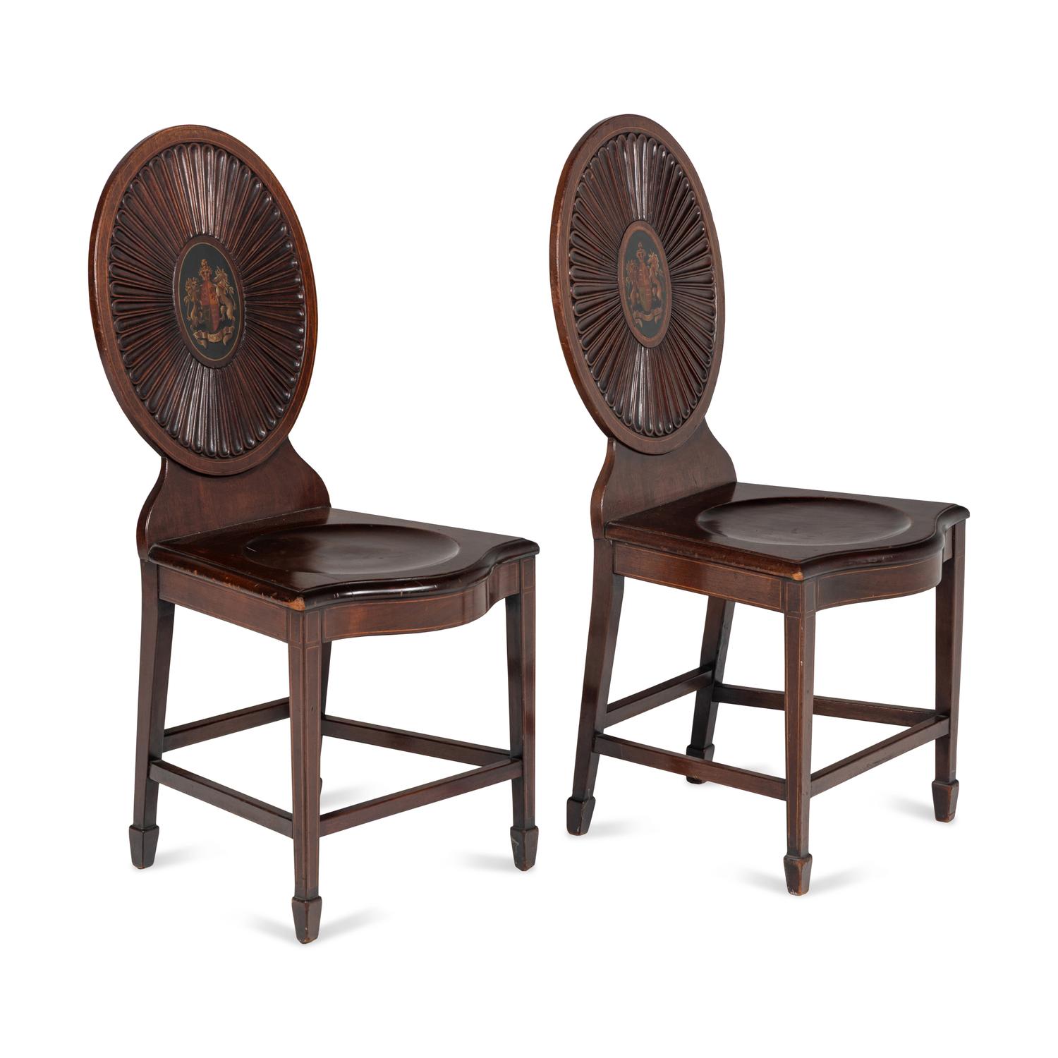 A Pair of Regency Style Mahogany and Polychrome Decorated Hall Chairs