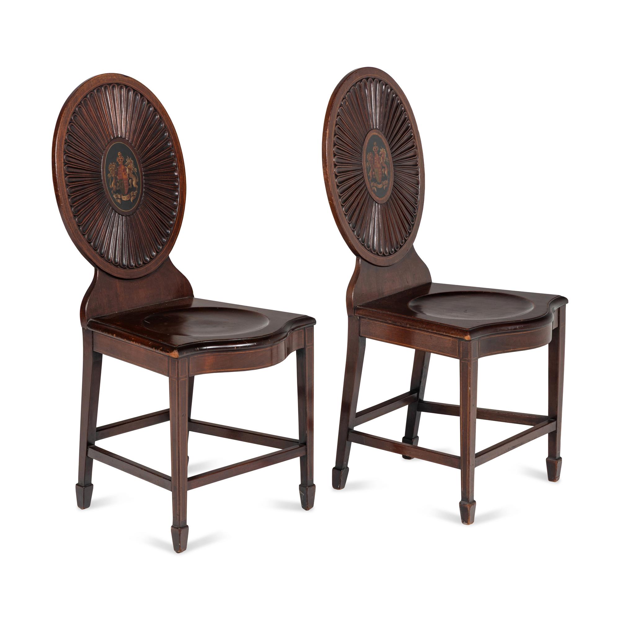 A Pair of Regency Style Mahogany and Polychrome Decorated Hall Chairs