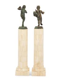 A Matched Pair of Bronze Figures on Resin Veneered Columns