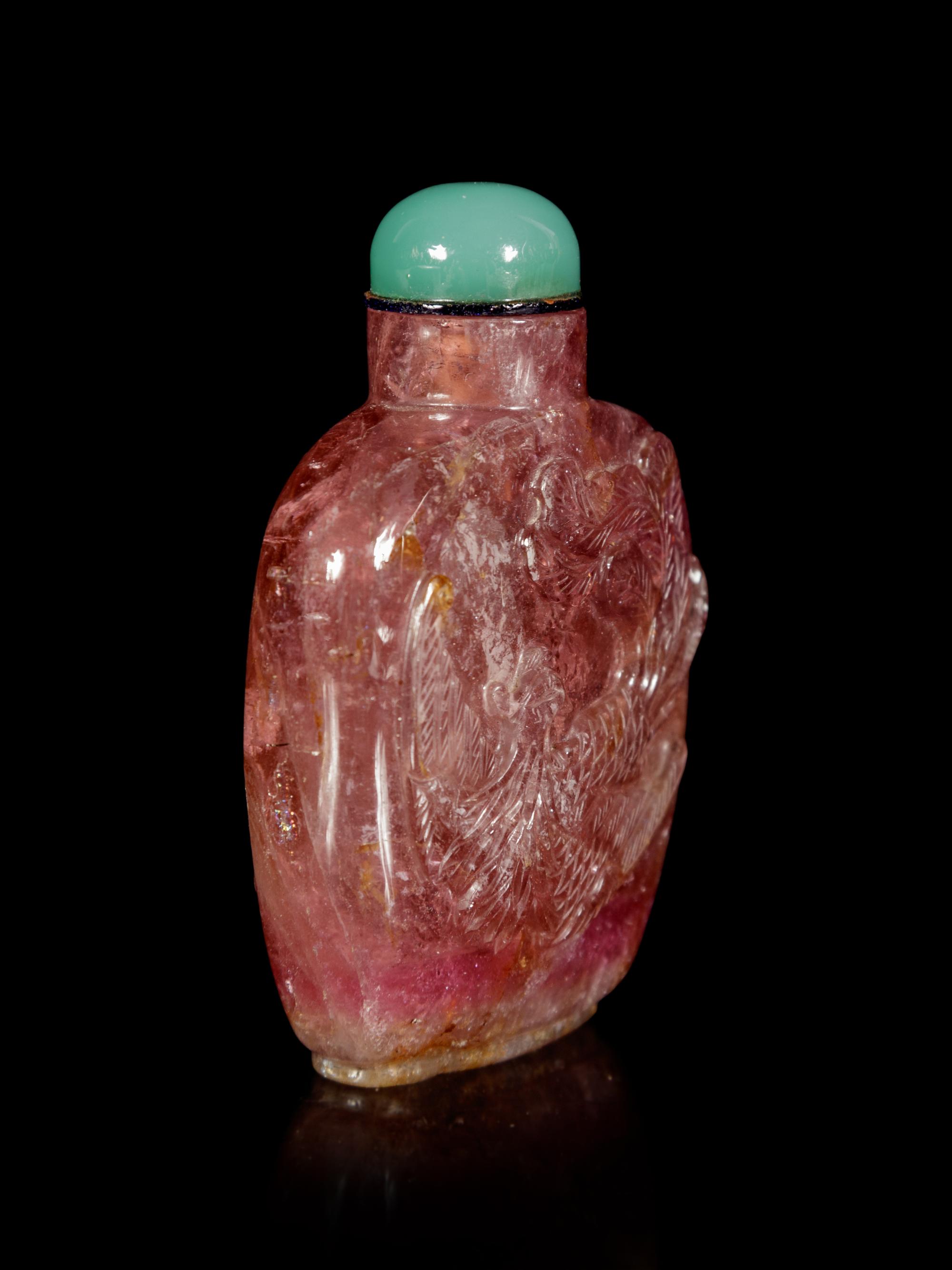 A Tourmaline 'Dragon and Phoenix' Snuff Bottle