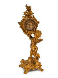 A French Gilt Bronze Figural Clock