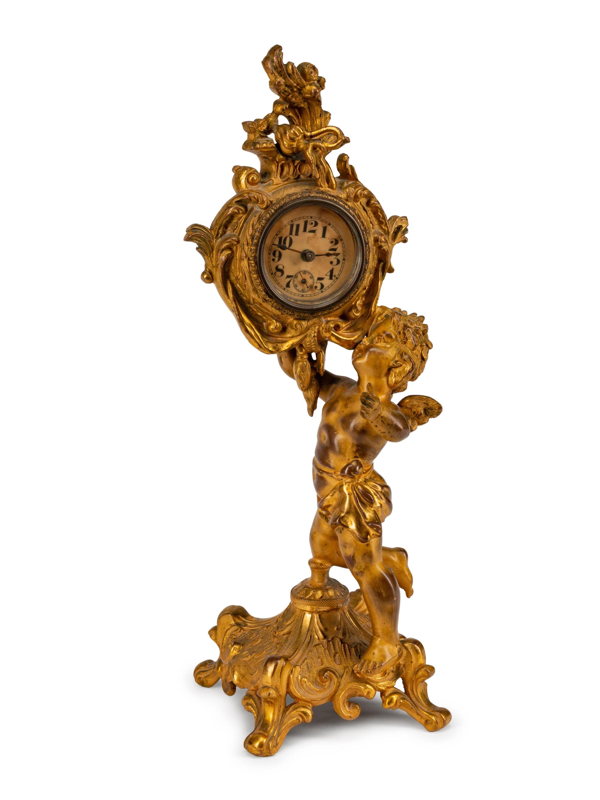 A French Gilt Bronze Figural Clock