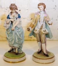 A Pair of German Porcelain Figures. Height 12 1/2 inches.