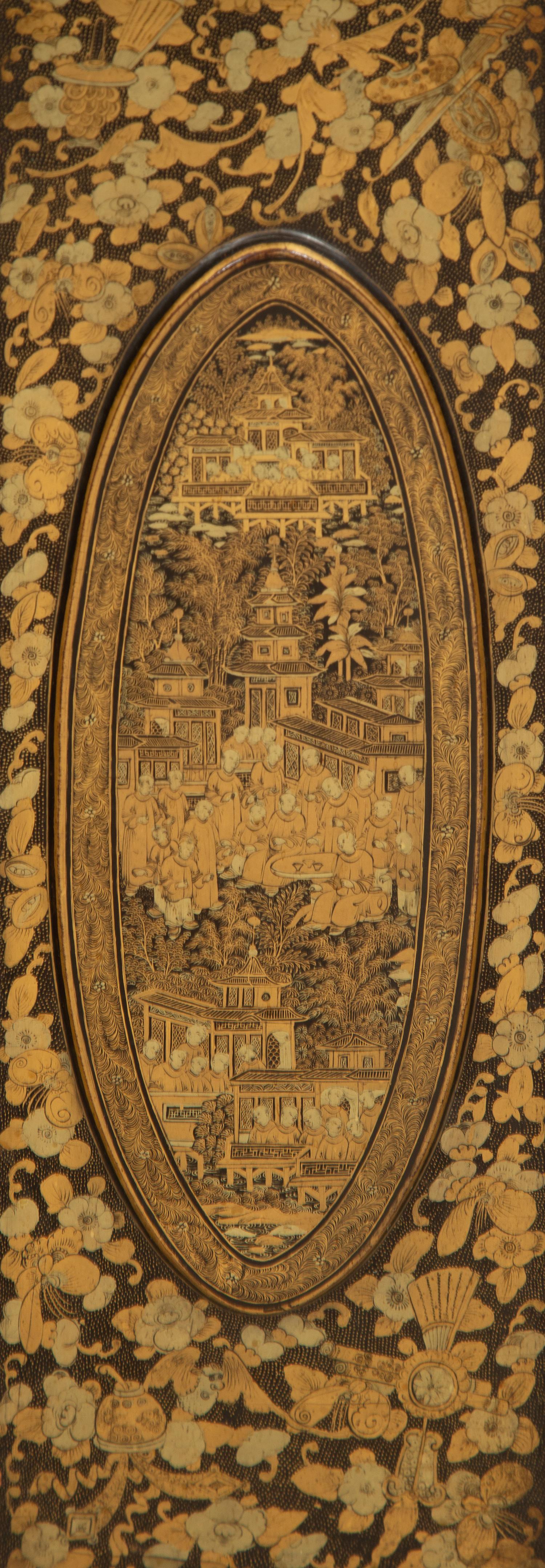 An English Black and Gilt Chinoiserie Decorated Cabinet with Interior Drawers