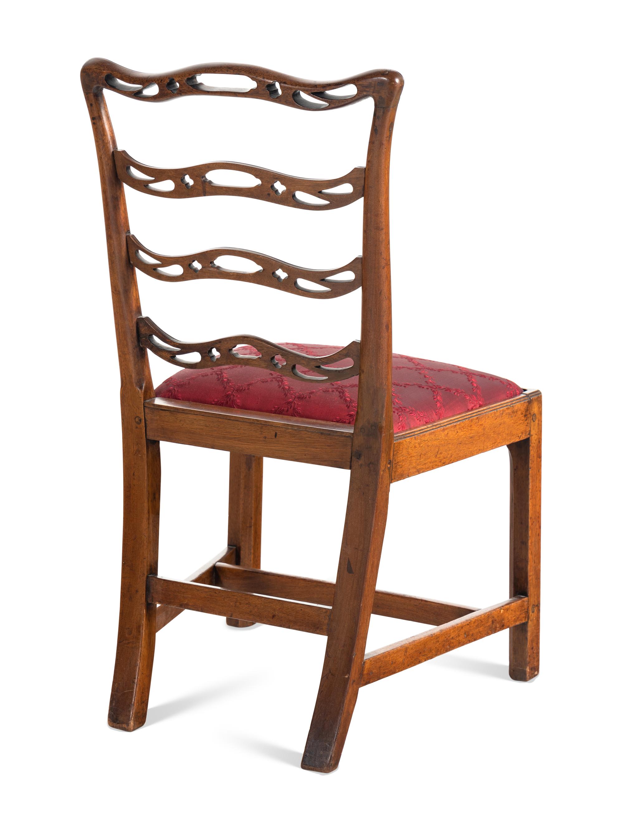 A Set of Six Federal Pierced and Carved Mahogany Dining Chairs